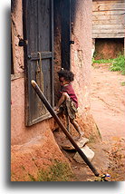 Girl at the House Entrance::Antoetra, Madagascar::