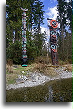 Two Totem Poles::Vancouver, British Columbia, Canada::