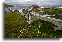 Fishing Nets on the Shore::Fishing house and small fishing wharf in St. Modeste, Labrador::