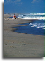 Surfer na plaży::Karolina Północna, Stany Zjednoczone::